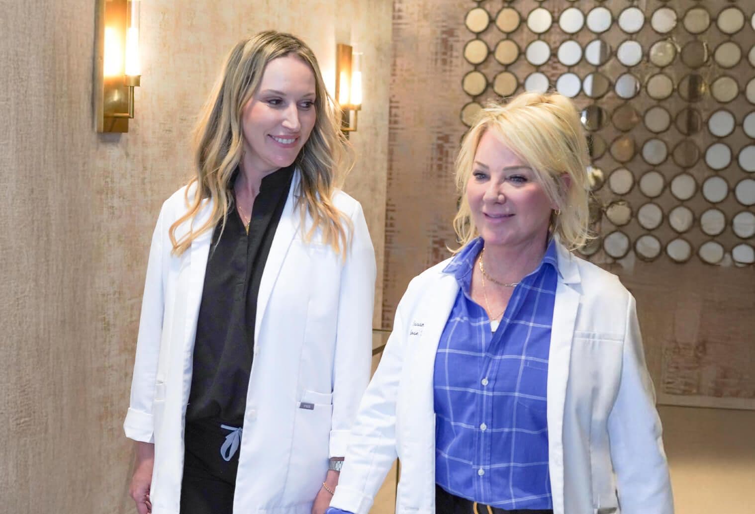 Two women in lab coats