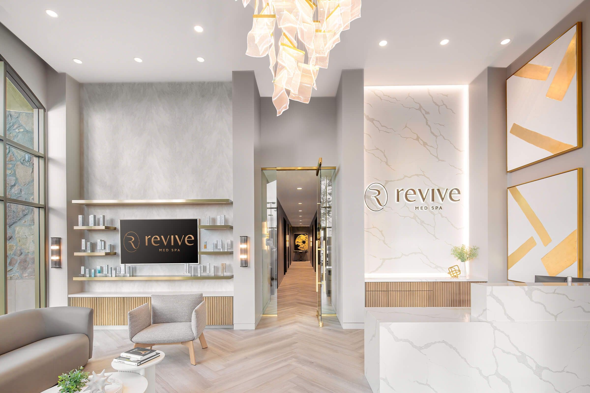 Empty lobby with reception desk for Revive Med Spa